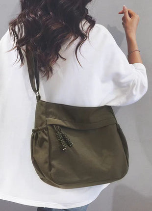 Adjustable Canvas Shoulder Bag with Multiple Pockets