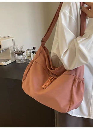 Adjustable Canvas Shoulder Bag with Multiple Pockets